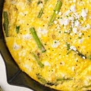Asparagus frittata Pinterest graphic with text and photos.