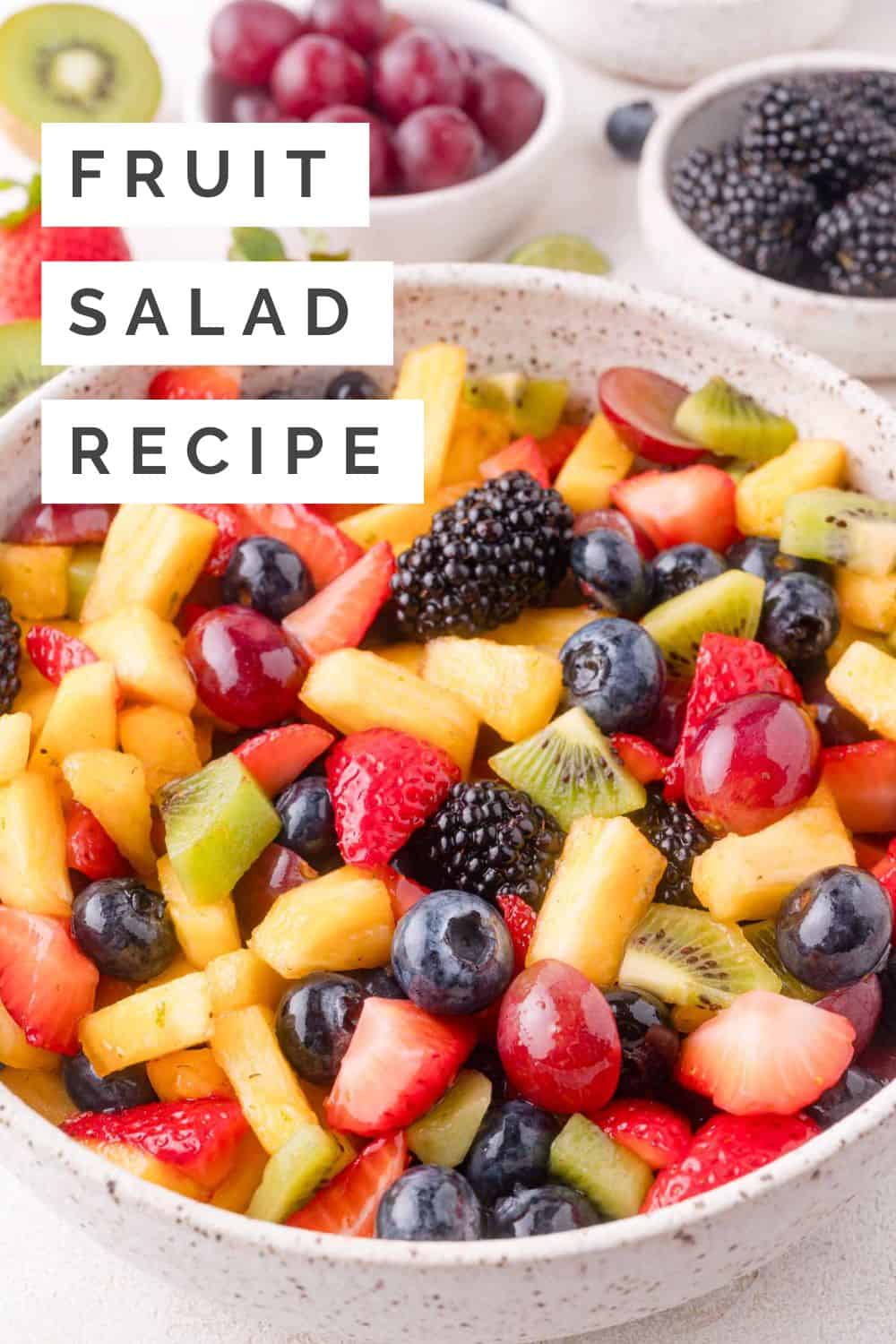Fruit salad Pinterest graphic with text and photos.