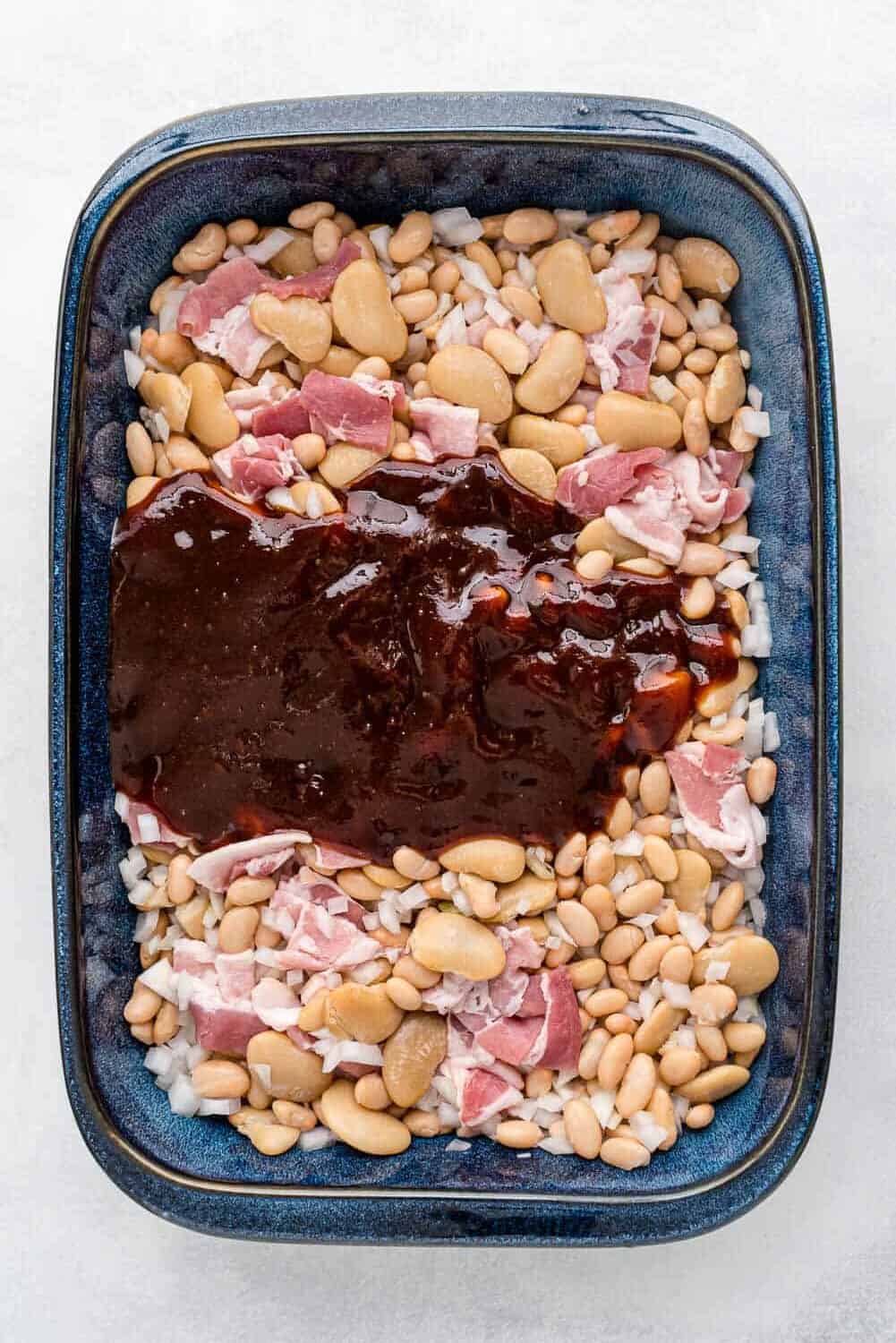 Sauce poured over beans.