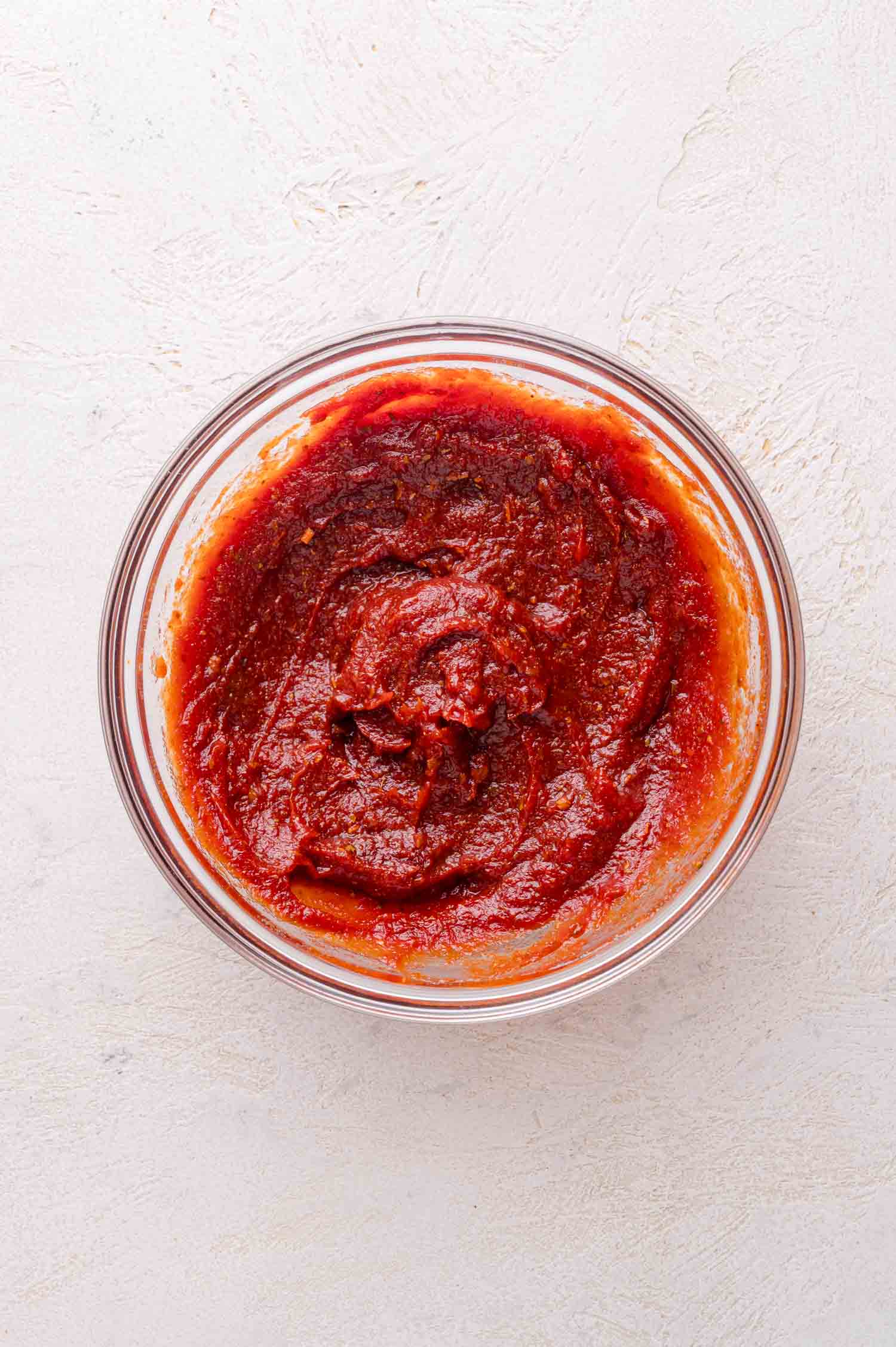 A bowl of red chipotle sauce.