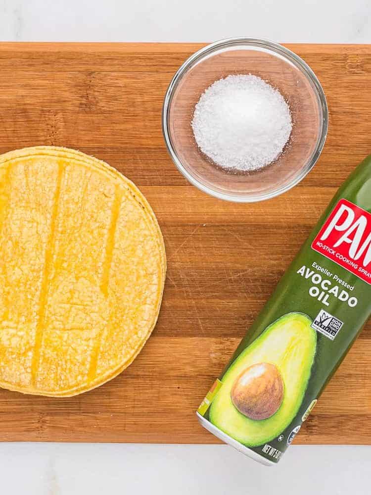 Ingredients needed for recipe on wooden cutting board.