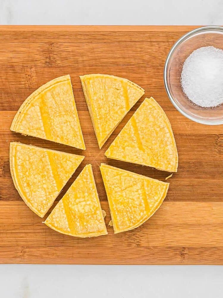 Stack of tortillas cut into six portions.