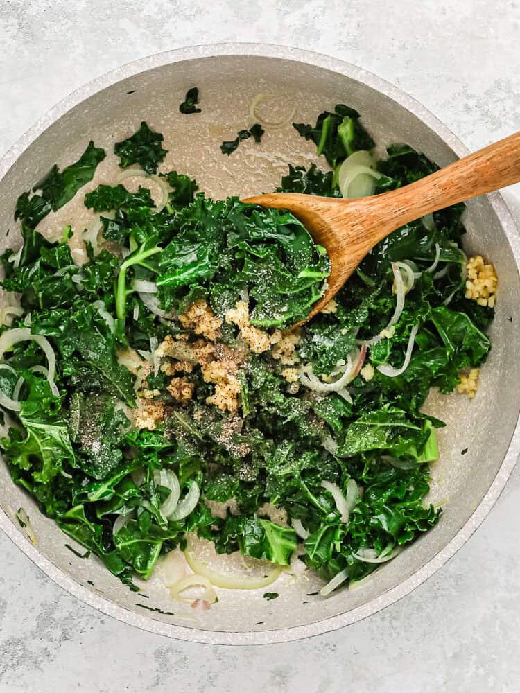Kale being sautéed.