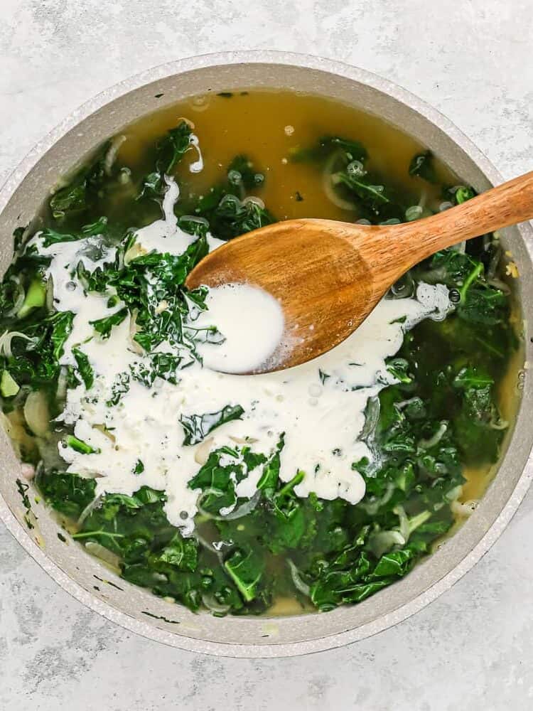 Cream and broth added.