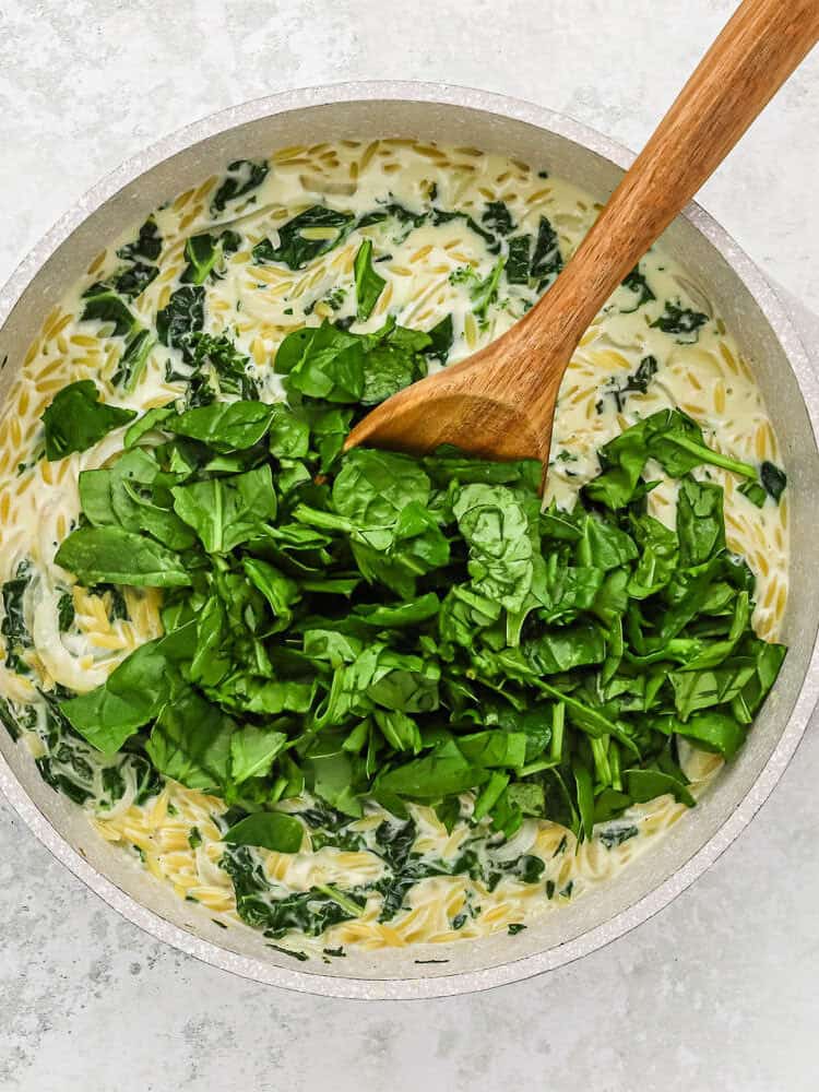 Spinach added to pan.