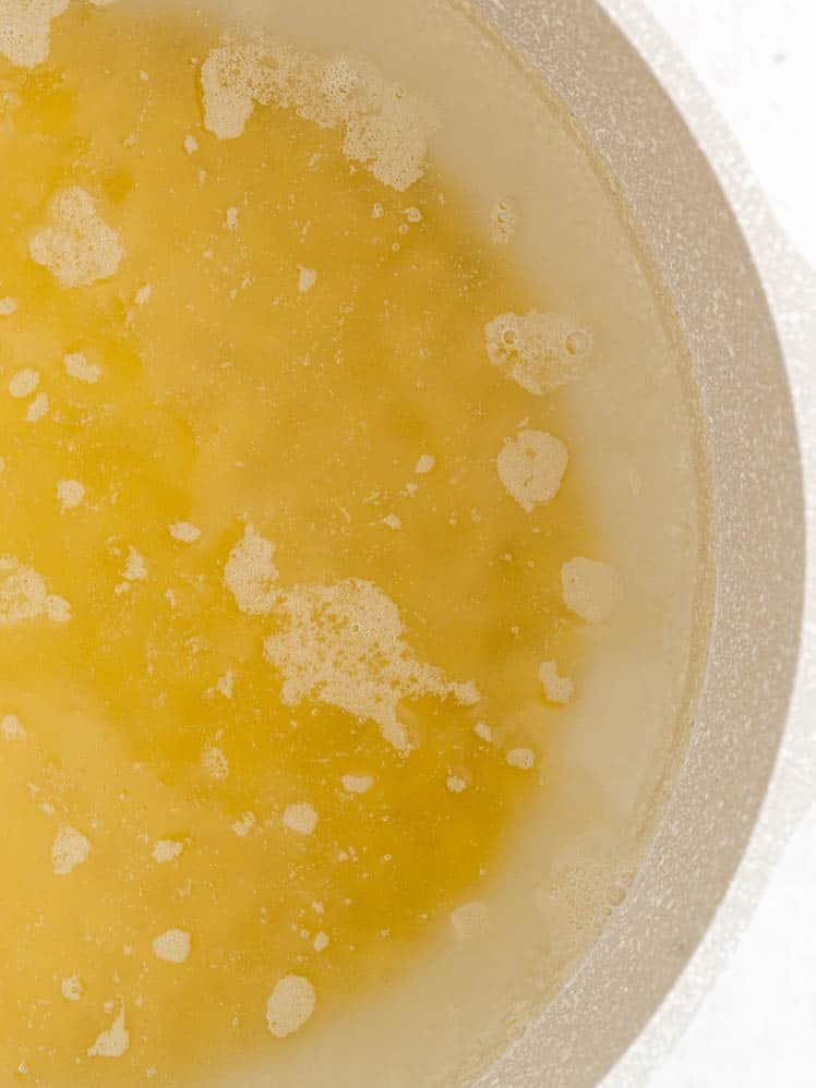 Orzo in boiling water.