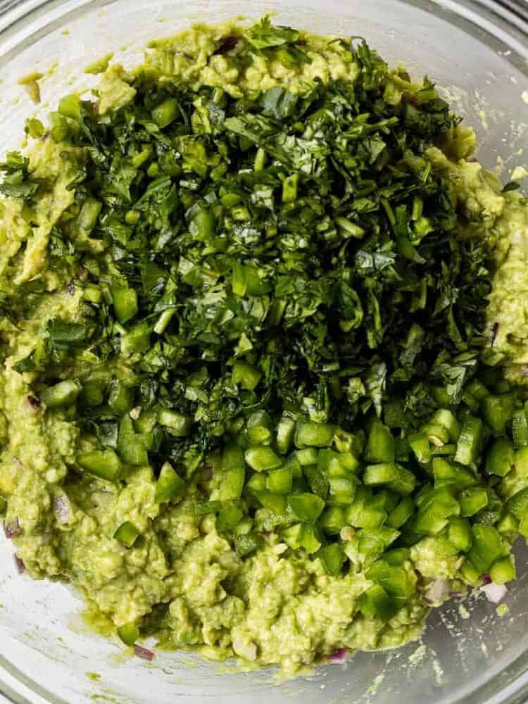 Jalapeno and cilantro on top of mashed avocado.