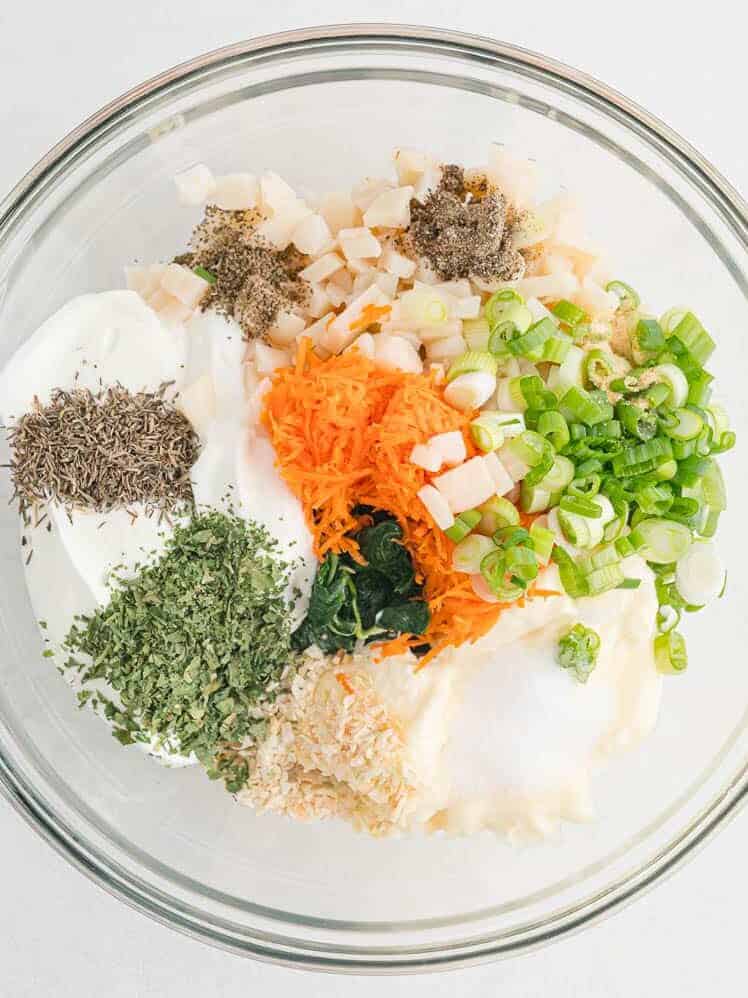 Ingredients, unmixed, in a clear glass bowl.