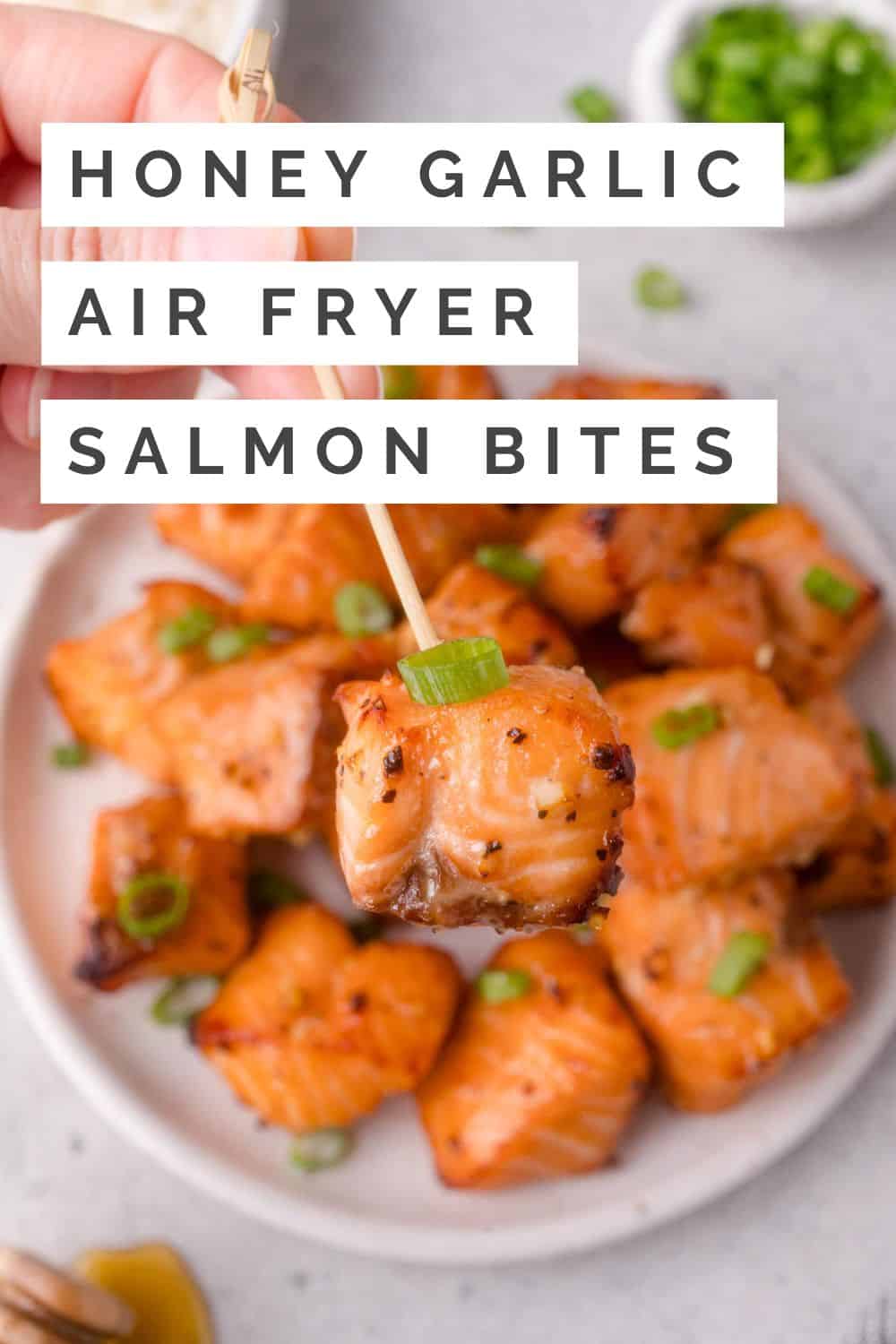 Honey garlic air fryer salmon bites Pinterest graphic with text and photos.